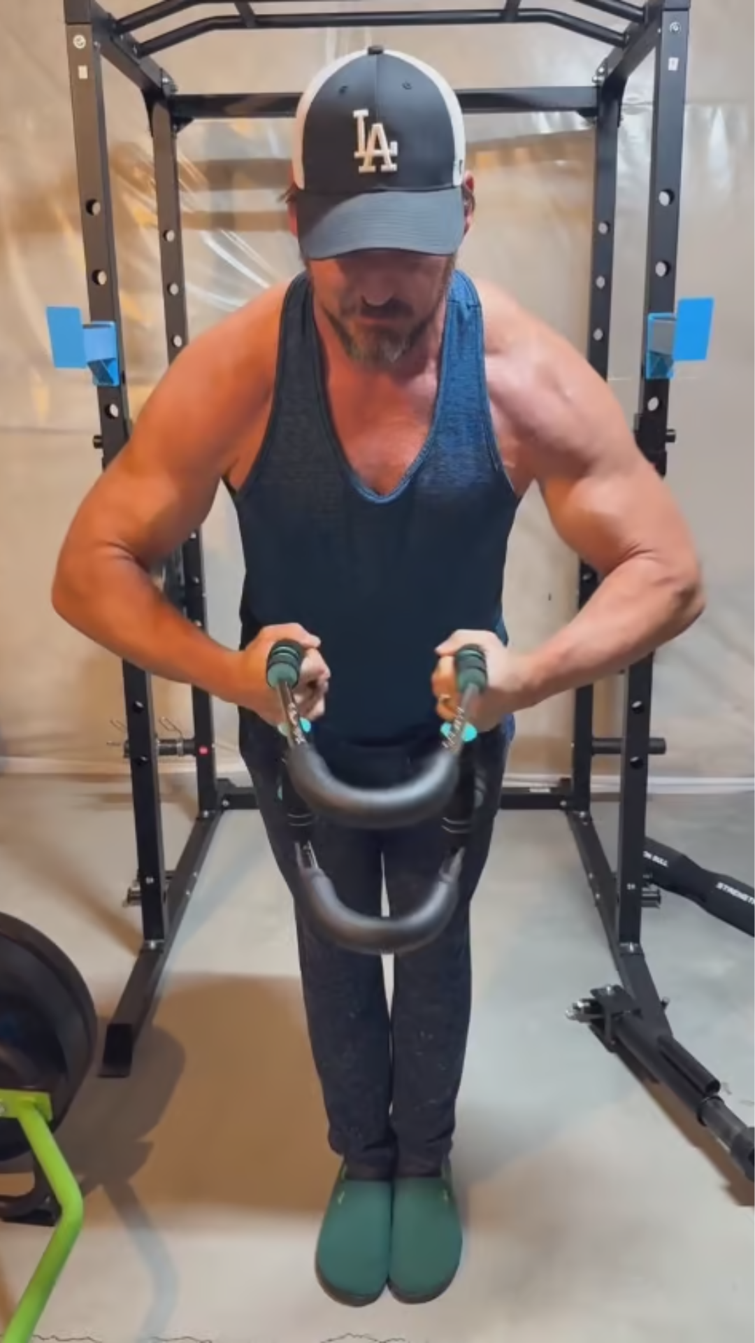 Customer training with the Iron Haul Gorilla Bar in a home power rack